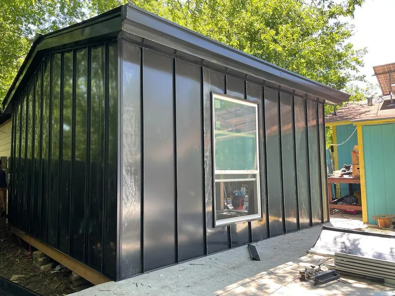 Black standing seam metal wall panels for Metal Roof Installation in Taylorville